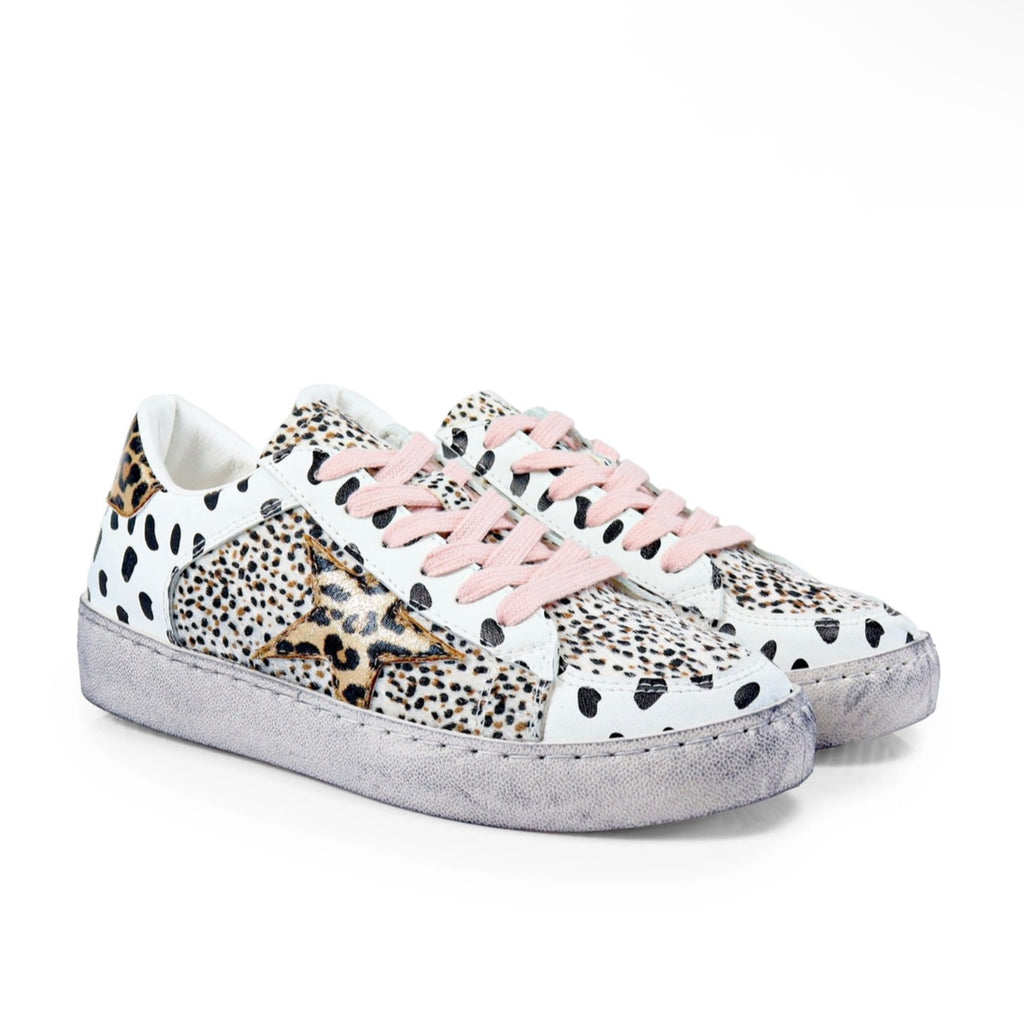 the “josie” distressed animal print sneakers. RTS