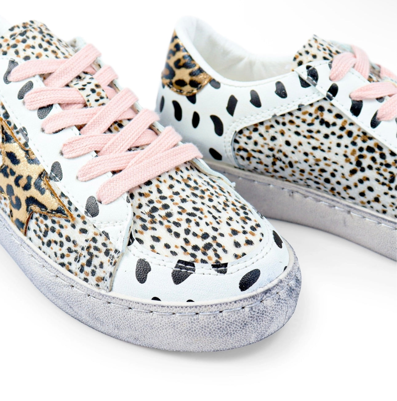 the “josie” distressed animal print sneakers. RTS