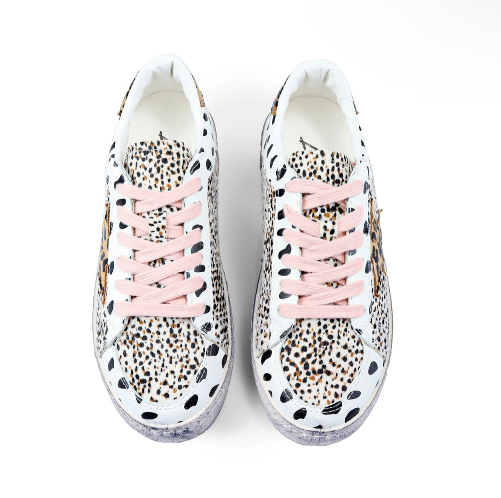 the “josie” distressed animal print sneakers. RTS