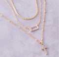 Triple layered chain pave cross pendant necklace